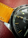 105.003-63 ed white omega speedmaster with rare decimal bezel at Brittons watches